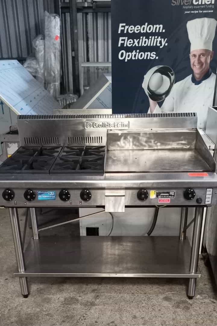 Second hand "GOLDSTEIN" 4 Burners and Griddle + stainless steel Stand